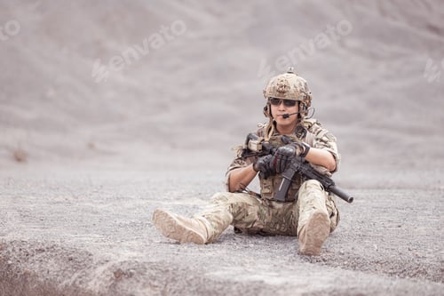 Preview: Soldiers in camouflage military uniforms carrying weapons Reconnaissance missions in rugged mountain