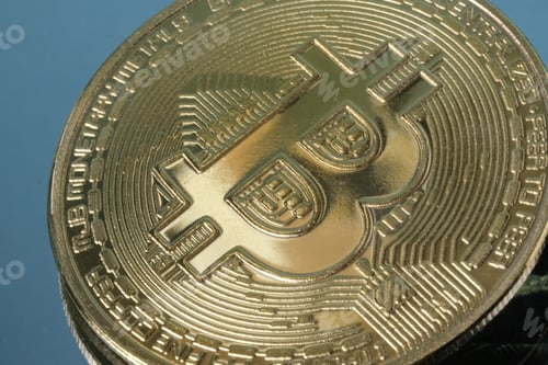 Preview: Defocused golden bitcoin. Crypto currency Gold BTC Bit Coin close up of coins. Blockchain technology