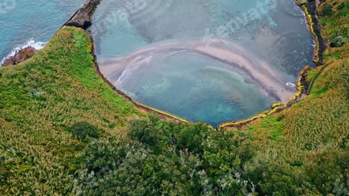 Preview: Aerial calm lagoon water in morning. Picturesque nature landscape at seaside.