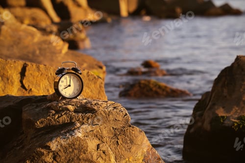Preview: Alarm Clock Standing On A Bright Background