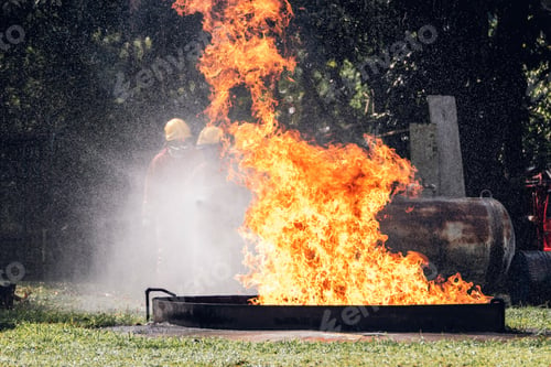 Preview: Fire flame in a firefighting training exercise. Firefighter training Concept.