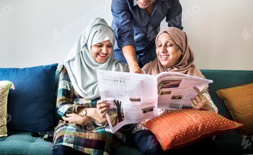 Preview: Muslim family reading the news