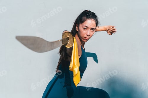 Preview: Chinese young woman practicing wushu kung fu.