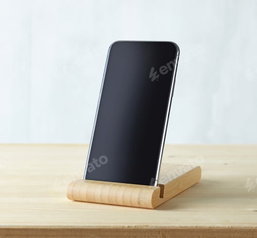 Preview: smartphone on light wooden table