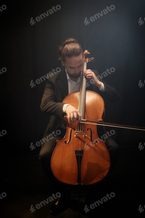 Preview: Professional Cellist Performing on Stage During Solo Concert