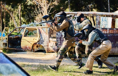 Preview: Team, paintball and army moving on the attack in extreme adrenaline sport, battle or war in the nat