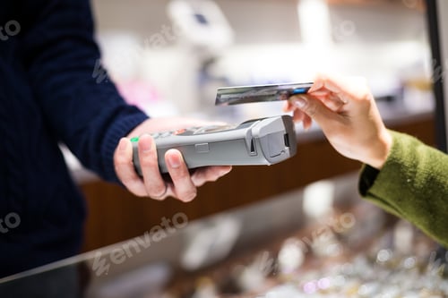 Preview: Customer paying credit card with NFC technology
