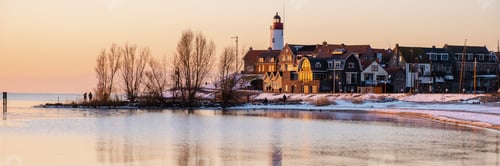 Preview: Lighthouse of Urk during winter with snow cold weather in the Netherlands