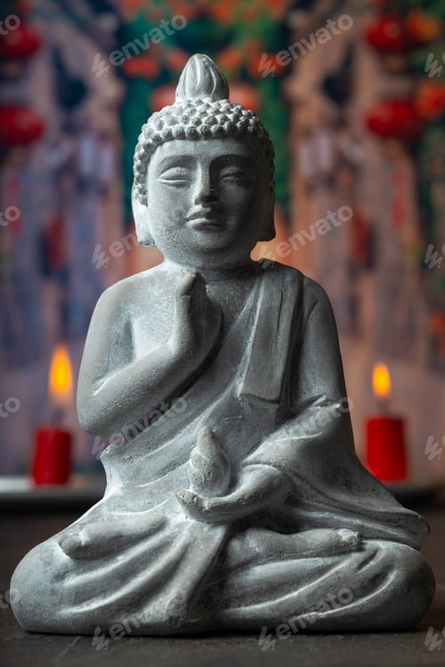 Preview: stone statue of buddha on a stone window sill surrounded by flowers and smoke - asian celebrations