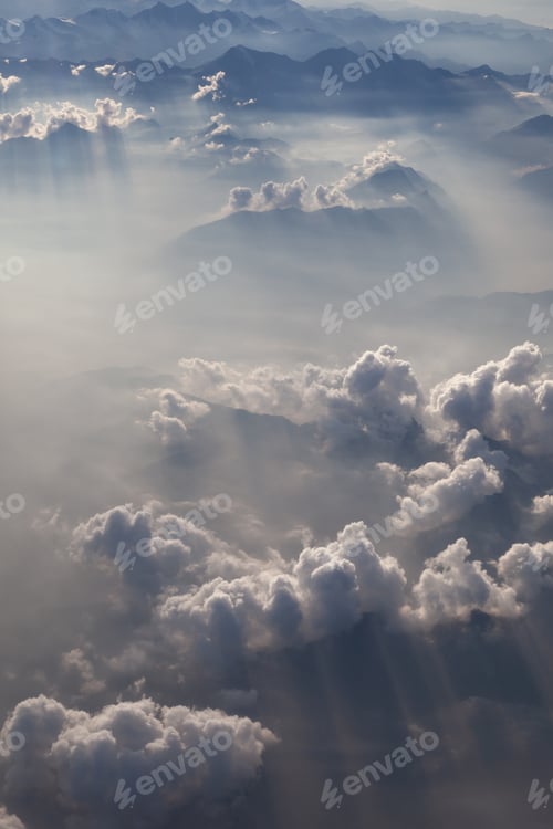 Preview: Fluffy white clouds, a view from airplane window