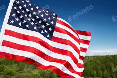 Preview: Waving usa flag against blue sky