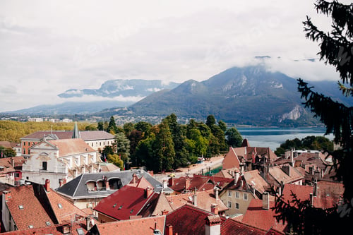 Preview: Annecy city top view, lake in the distance. Tile roofs, Cathedral