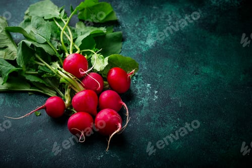 Preview: Fresh organic radish on green background