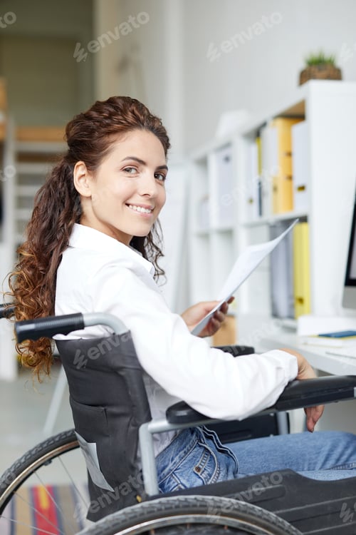 Preview: Young accountant in wheelchair