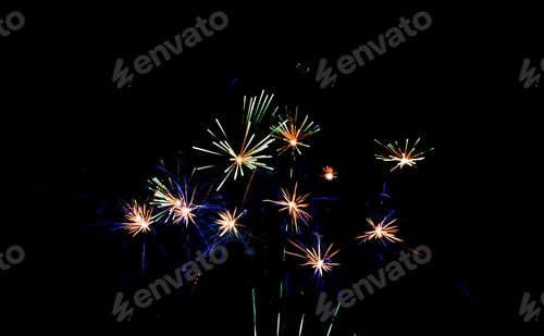 Preview: Multicolored fireworks in the night sky. Celebration of Independence Day, New Year