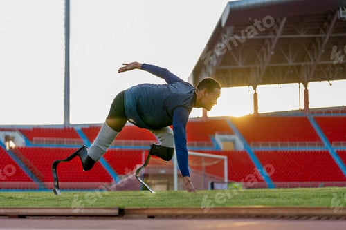 Preview: Sport man athlete prosthesis legs stay in the position of start running and look forward