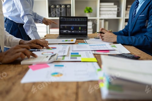 Preview: Meeting with financial advisors to analyze production costs and analyze marketing charts.