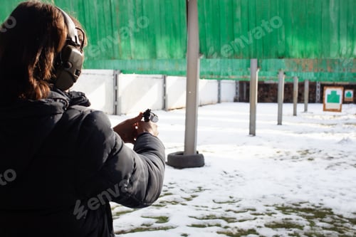 Preview: A man shoots a target in a dash. sports, entertainment, firearms, gun