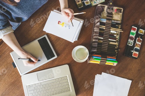 Preview: Top view woman artist working desk