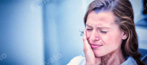 Preview: Unhappy woman having a toothache