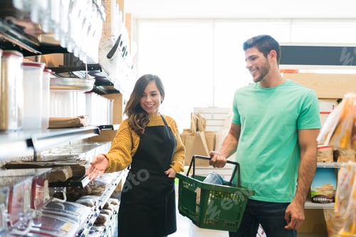 Preview: Saleswoman Showing Food Products To Consumer