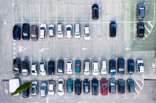 Preview: Aerial view on the cars on park place. View from drone on the carpark.
