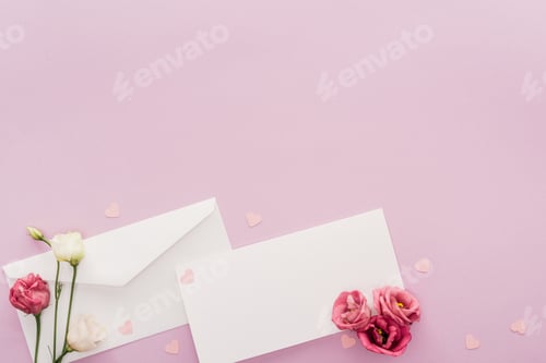 Preview: top view of empty card, paper hearts and envelope isolated on pink