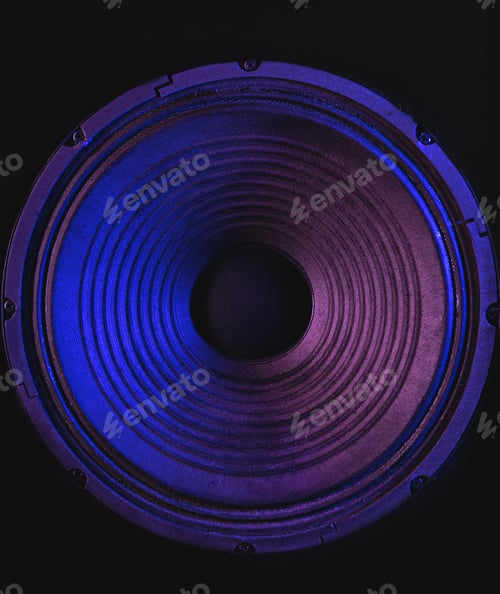Preview: Close-up of speaker membrane on black background.