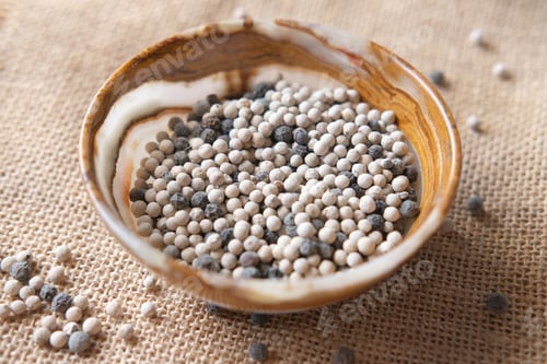 Preview: mixed pepper in a bowl on table , top view