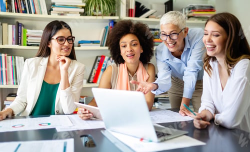Preview: Group of successful business women working together in office. Business people meeting concept