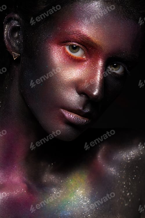 Preview: Beautiful girl with art space makeup on her face and body. Glitter Face.