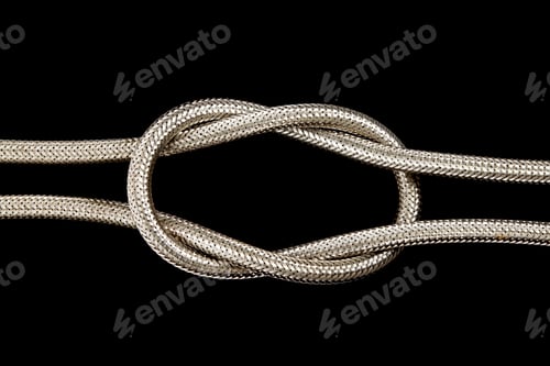 Preview: Metal hose pipe isolated on a black background