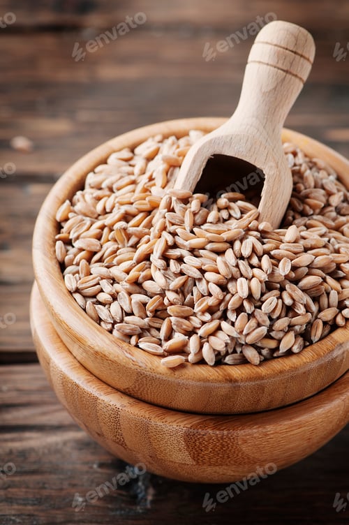 Preview: Raw pearl barley on the wooden table