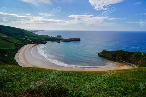 Preview: Aerial shot of the beautiful beach and ocean captured in Niembru, Spain