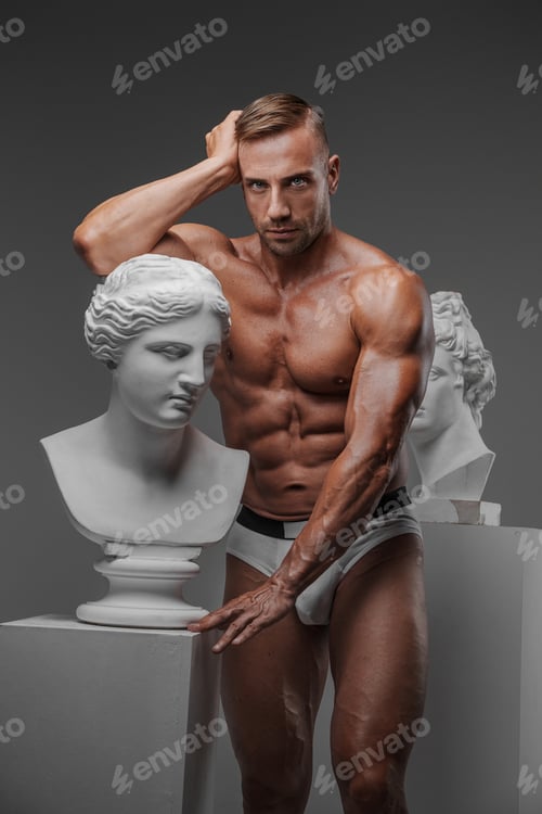 Preview: A muscular masculine man wearing only underwear