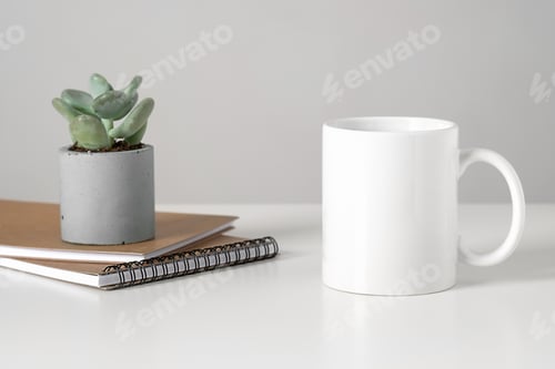Preview: White mug mockup on table in minimalist interior, business concept