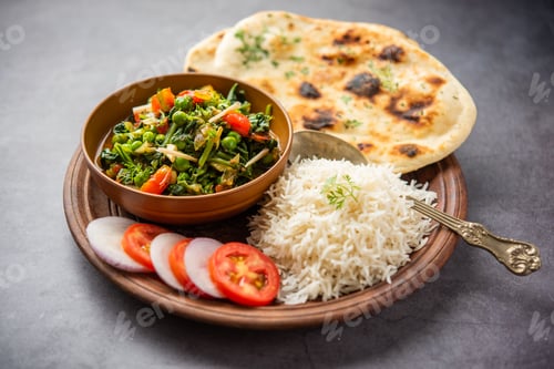 Preview: palak matar curry also known as spinach geen peas masala sabzi or sabji, indian food