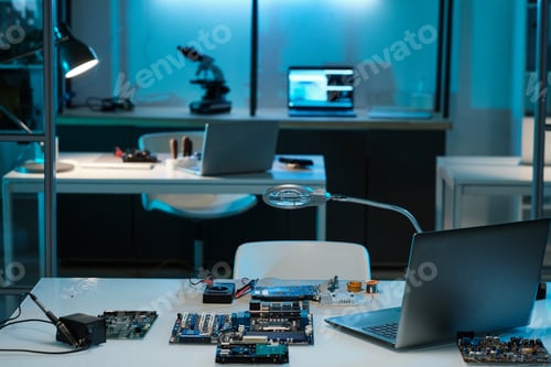 Preview: Workplace of repairman or technician with laptop and hardware