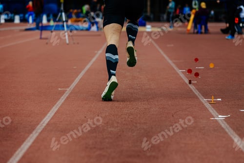 Preview: back running on track jumper athlete