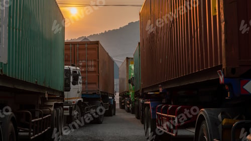 Preview: Cargo Container Truck at Ship yard at sunset. Truck transportation export and Import shipping.