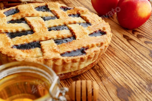 Preview: Berry tart pie served on table close up