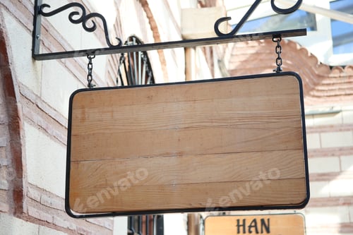 Preview: Street signboard mockup on modern city building