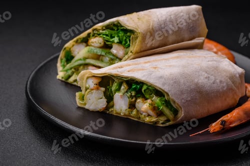 Preview: Delicious fresh roll with shrimps, tomatoes, lettuce and cucumber in pita bread