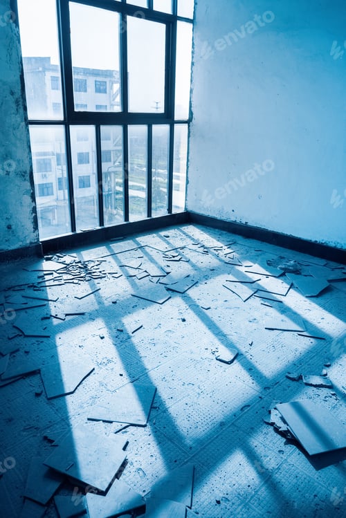 Abandoned Room with Broken Tiles and Sunlight