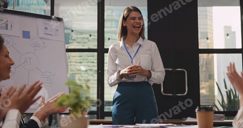 Preview: Confident businesswoman or speaker sharing ideas with colleagues or audience during seminar.