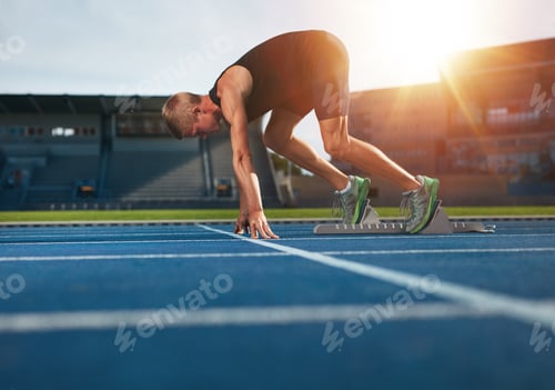 Preview: Young man on starting position about to run