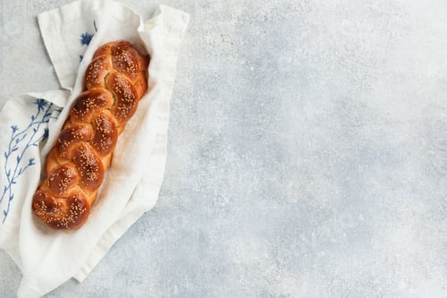 Preview: Sabbath kiddush ceremony composition. Challah bread. Freshly baked homemade braided challah bread fo