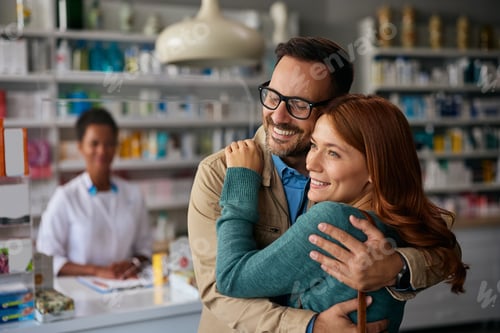 Preview: Portrait of embraced couple in a pharmacy.