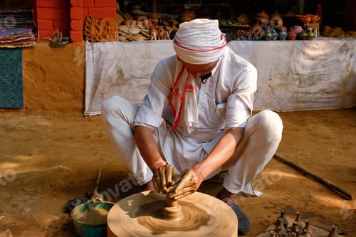 Preview: Indian potter at work, Shilpagram, Udaipur, Rajasthan, India