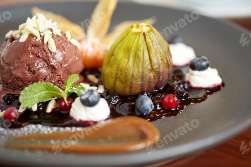 Preview: close up of chocolate ice cream dessert on plate